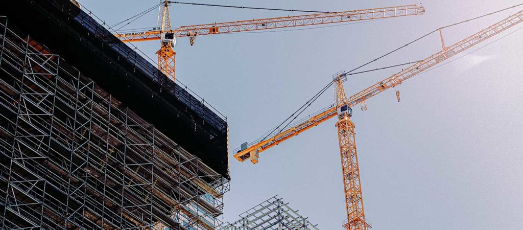 Cranes over a construction site - TrebleHook AEC and Construction CRM software